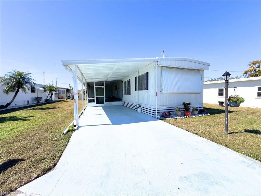 Property Photo:  153 Carissa Ln 85  FL 34114 