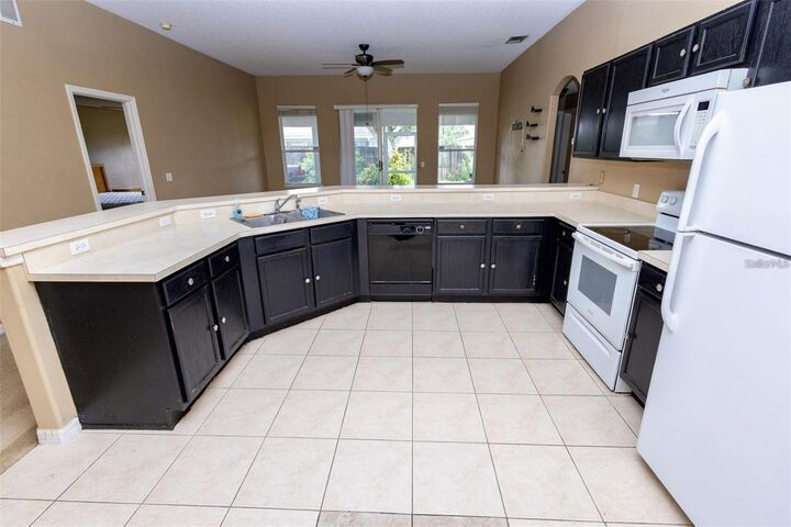 Property Photo:  818 Carrousel Lane  FL 34759 