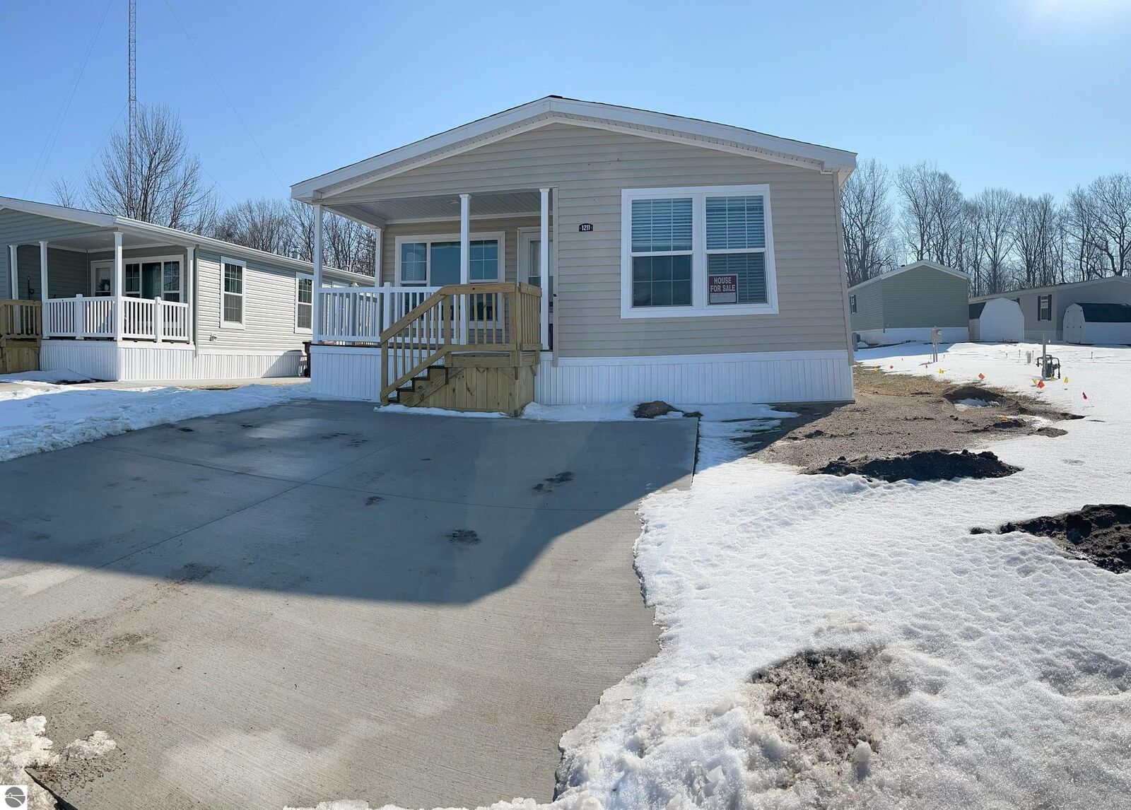 Property Photo:  1211 Wellington Drive  MI 48858 