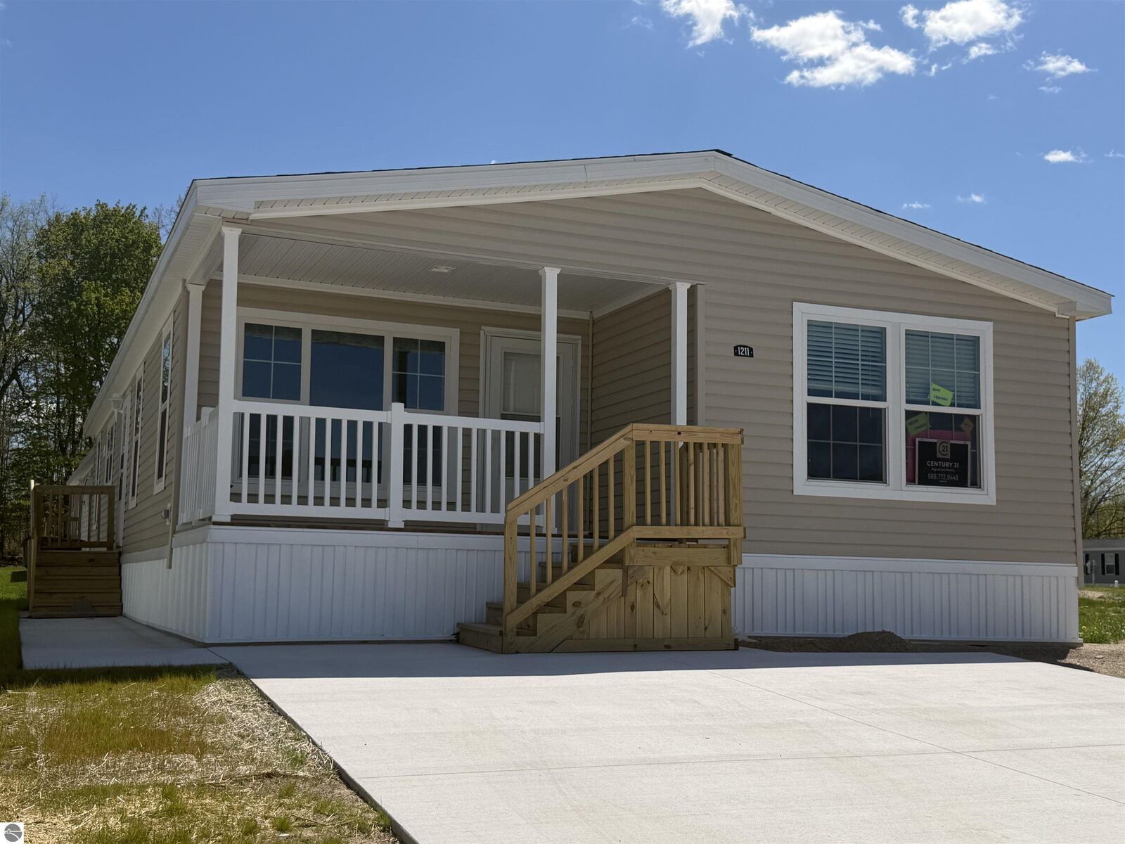 Property Photo:  1211 Wellington Drive  MI 48858 