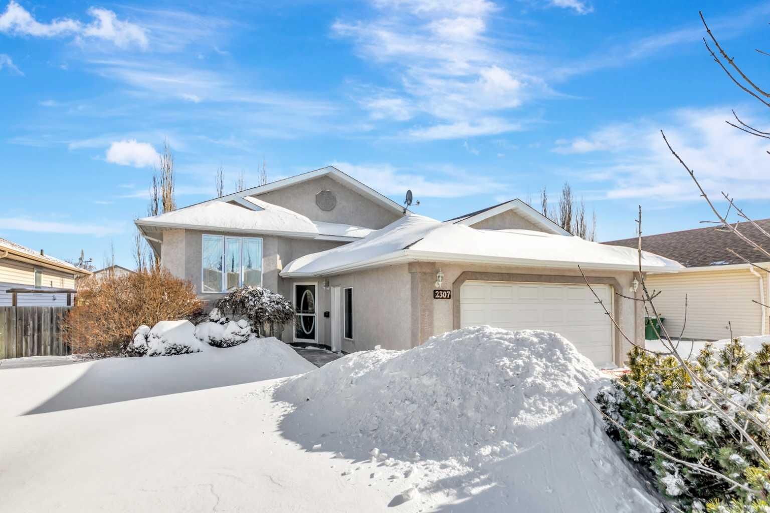 Property Photo:  2307 57B Avenue  AB T9V 2W5 