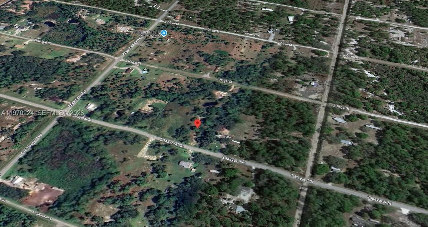 Property Photo:  745 S Mayoral St  FL 33440 
