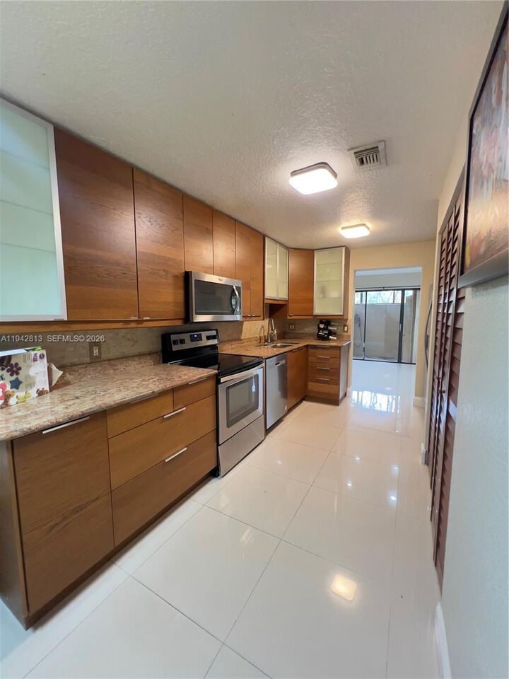 Property Photo:  1471 NW 94th Ave 240  FL 33024 