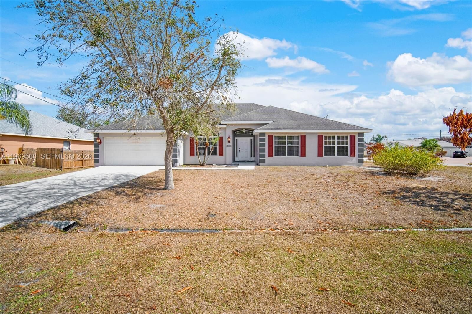 Property Photo: 6762 NW Daffodil Ln FL 34983
