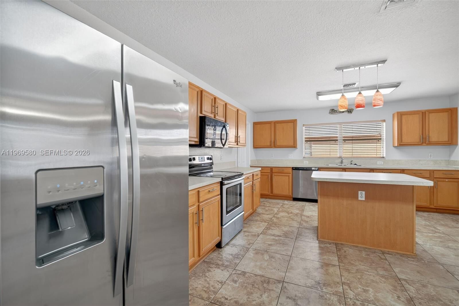 Property Photo:  6762 NW Daffodil Ln  FL 34983 