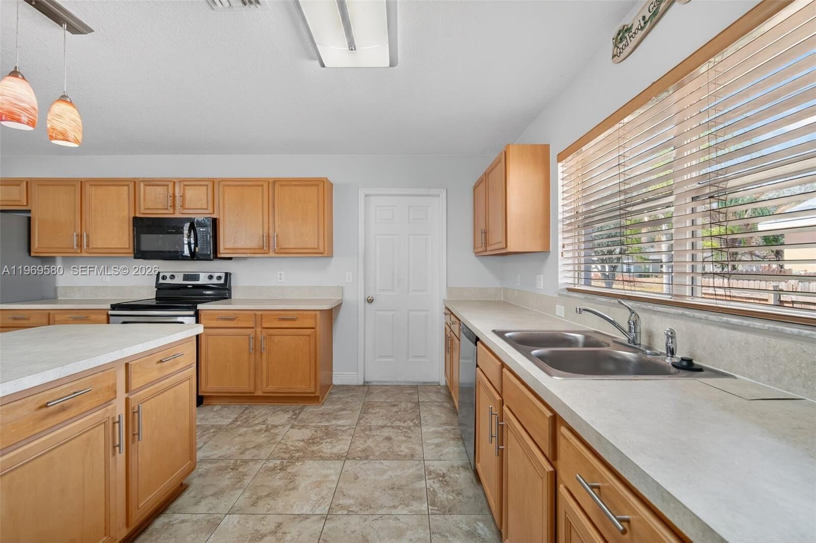 Property Photo:  6762 NW Daffodil Ln  FL 34983 