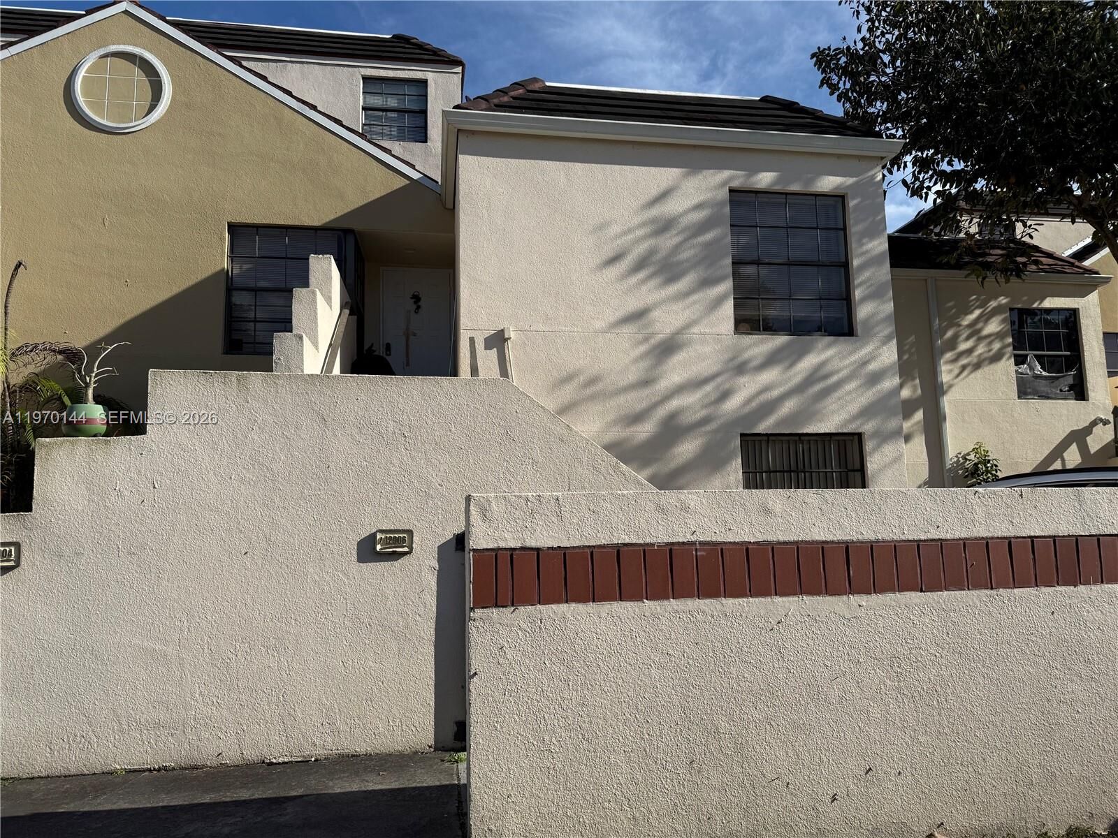 Property Photo:  12906 SW 88th Ter B-202  FL 33186 