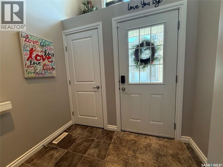 Property Photo: 2 697 Sun Valley Drive SK S4A 2X7