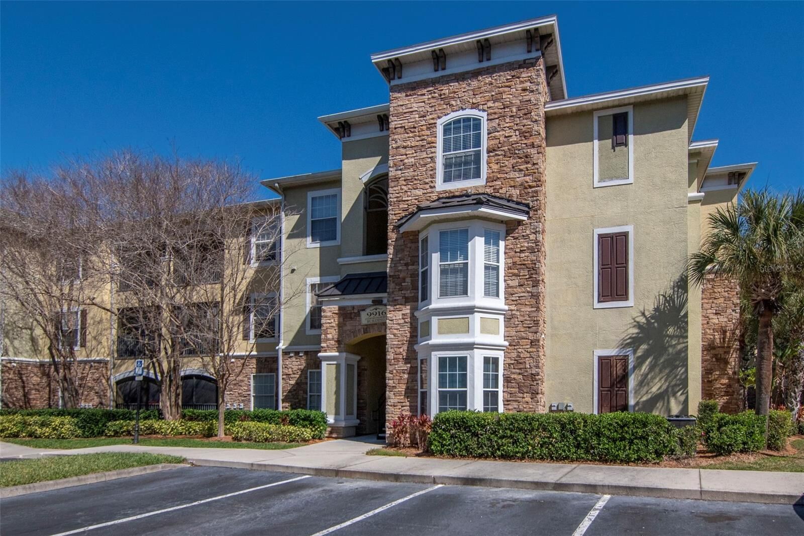 Property Photo:  9916 Courtney Palms Boulevard 103  FL 33619 