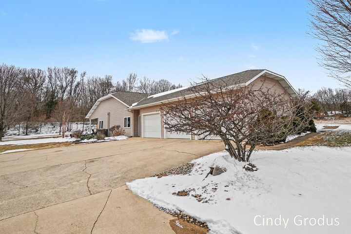 Property Photo: 8079 Pigeon Creek Drive MI 49460