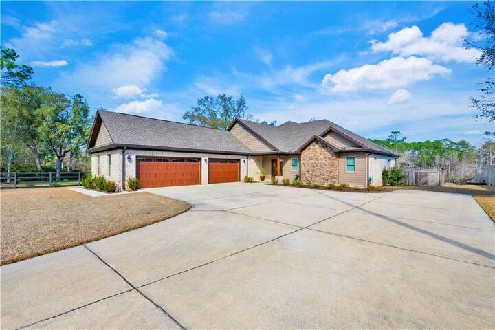 Property Photo:  9492 Neumann Drive  AL 36530 