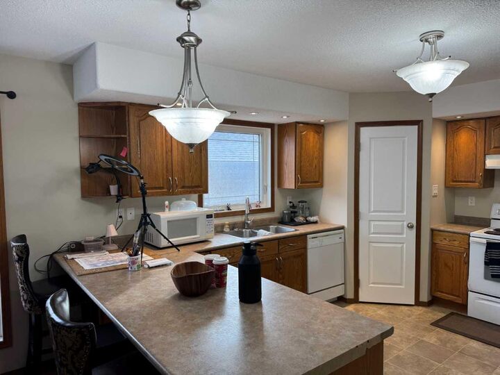 Property Photo:  2608B 11 Avenue  AB T9W 1W2 