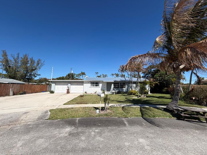 Property Photo:  5969 Pine Court  FL 33415 