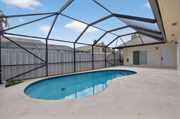 Property Photo:  5230 Woodruff Lane  FL 33418 