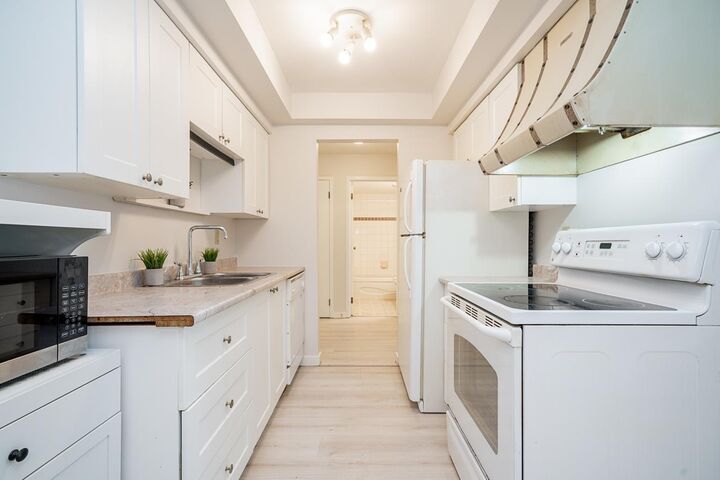 Property Photo:  106 33956 Essendene Avenue  BC V2S 6E7 