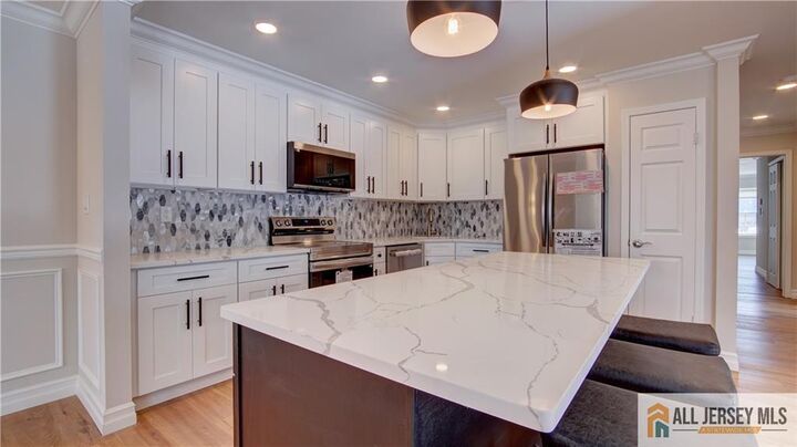 Property Photo: 16 Alexander Hamilton Court B NJ 08831