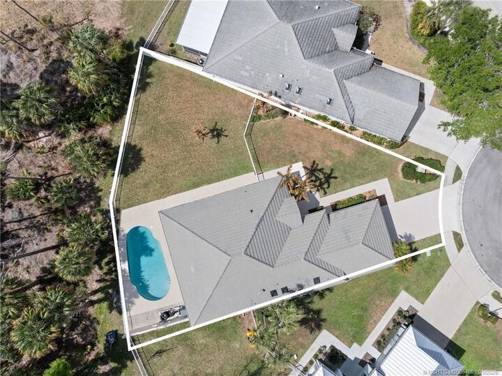 Property Photo:  7780 SE Needle Palm Circle  FL 33455 