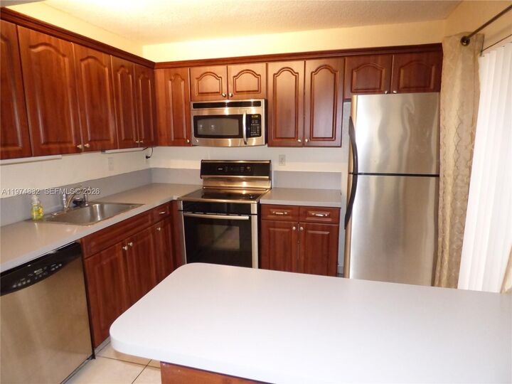 Property Photo:  20140 NE 3rd Ct 1  FL 33179 