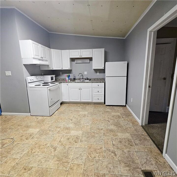 Property Photo: 335 N Main 3 NY 14103