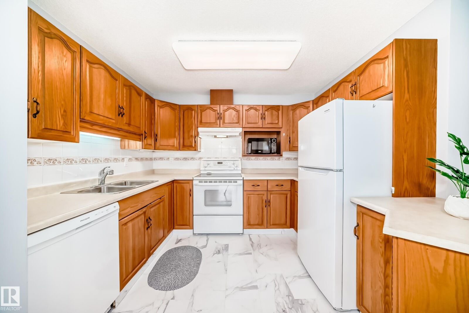 Property Photo:  13450 114 Avenue NW 302  AB T5M 4C4 