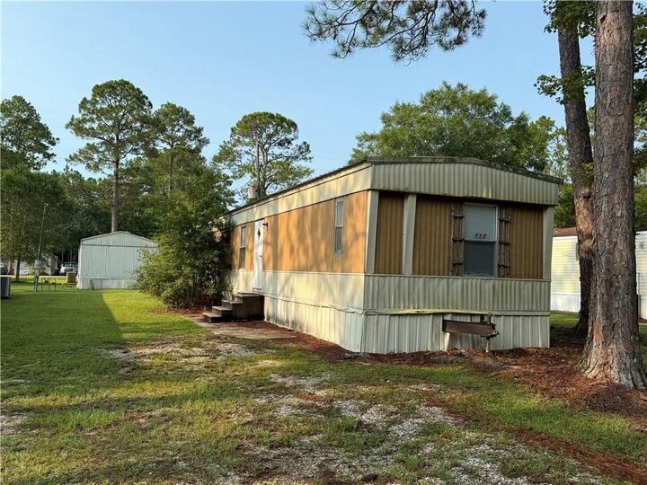 Property Photo:  64096 Mangano Road 117  LA 70452 