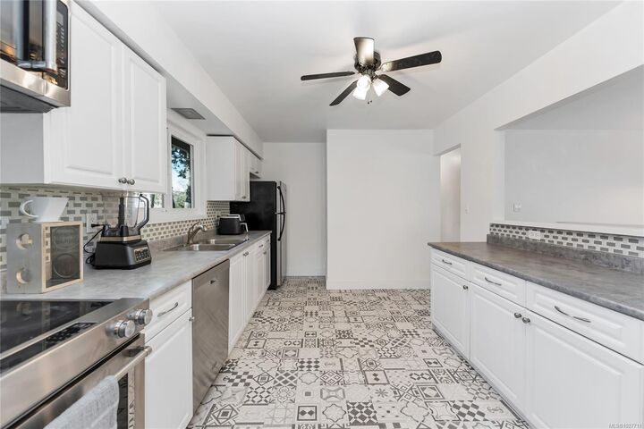 Property Photo:  2011 Courser Dr 1  BC V8L 2N5 