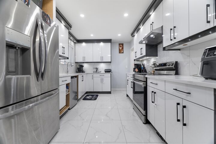 Property Photo: 12957 98B Avenue BC V3T 1C9