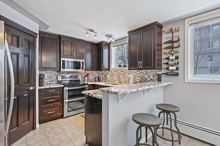Property Photo:  2416 Erlton Street SW 110  AB T2S 3B7 
