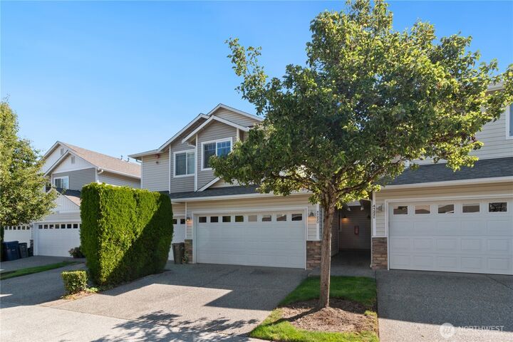 Property Photo:  4122  214th Street SW D  WA 98043 