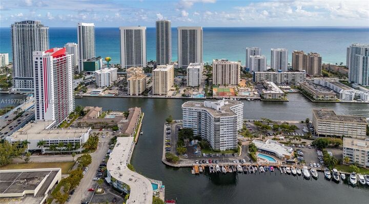 Property Photo:  100 Golden Isles Dr 104  FL 33009 