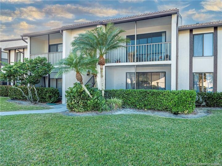 Property Photo:  1485 SW Silver Pine Way D-1  FL 34990 