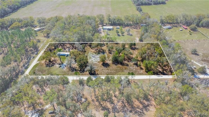 Property Photo:  5590 NW 76th Avenue  FL 32626 