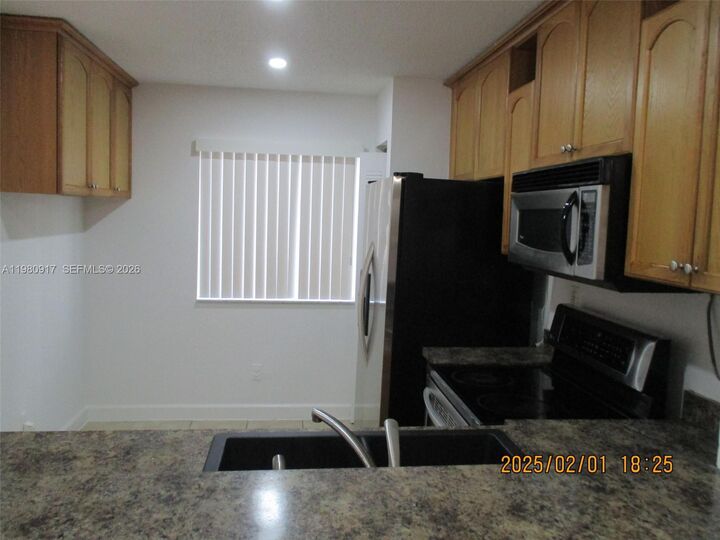 Property Photo:  13910 SW 175th Ter 13010  FL 33177 