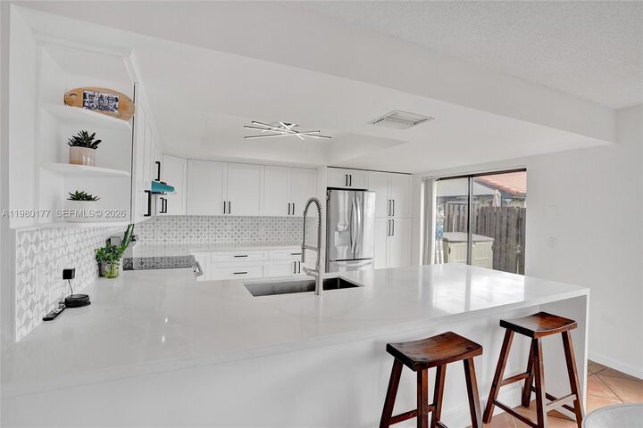 Property Photo:  15292 SW 46th Ln Br 64  FL 33185 