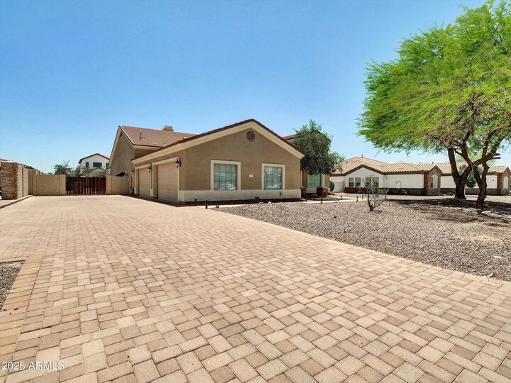 Property Photo:  8031 W Morten Avenue  AZ 85303 