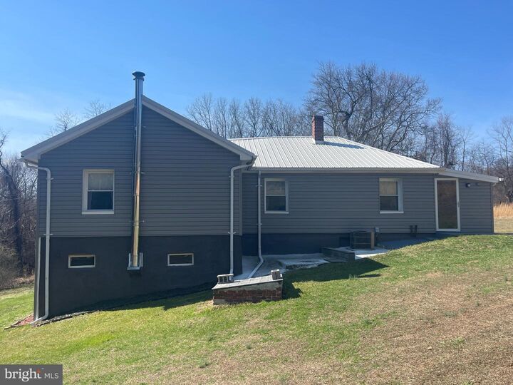 Property Photo:  13002 Moores Hollow Road SE  MD 21502 