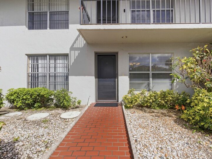 Property Photo:  13648 Coconut Palm Court A  FL 33484 