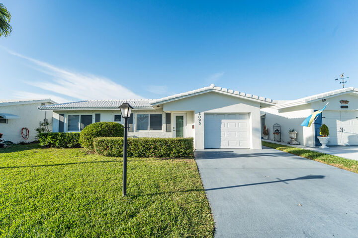 Property Photo:  2095 SW 14 Avenue SW  FL 33426 