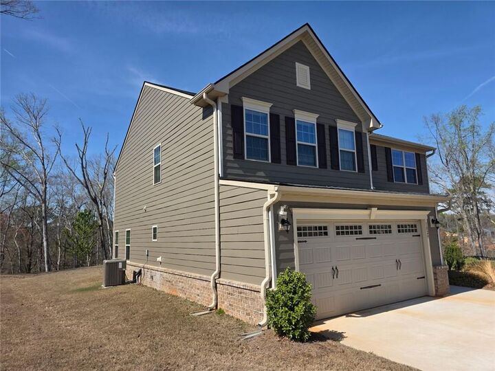 Property Photo:  1029 Climbing Rose Way  GA 30253 