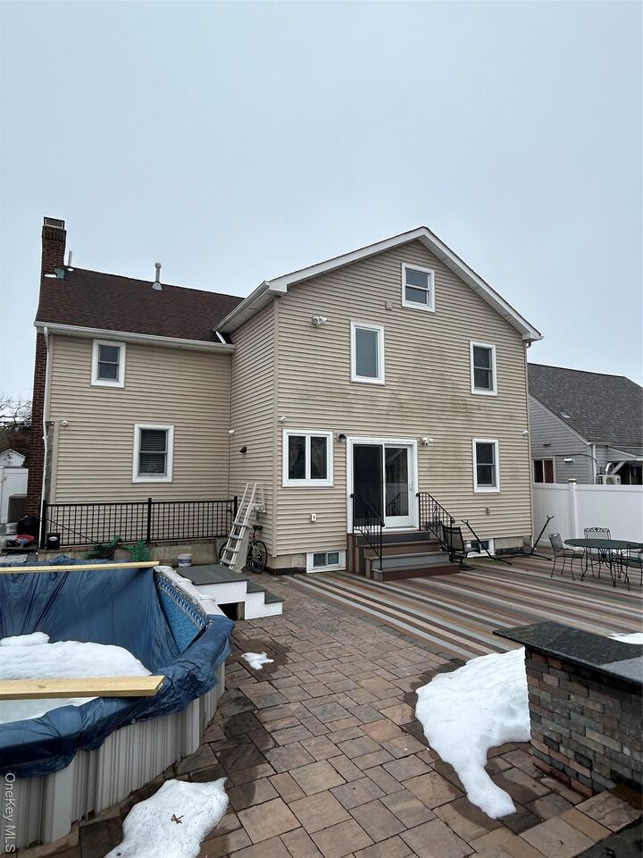 Property Photo:  869 De Mott Avenue  NY 11510 