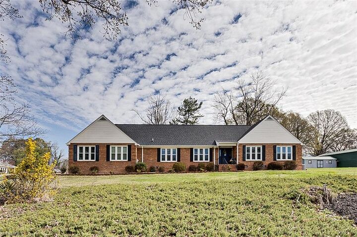 Property Photo:  4701 Liberty Road  NC 27406 