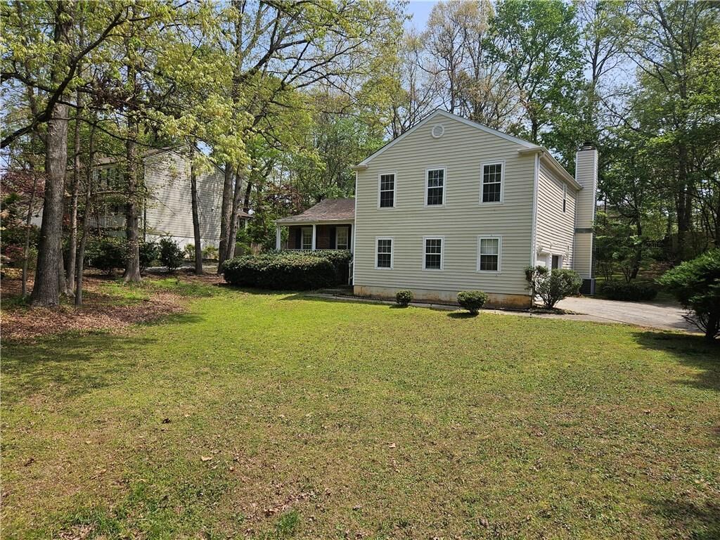 Property Photo:  3877 Peachtree Corners Circle  GA 30092 