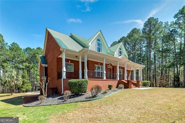 Property Photo:  4860 Peeksville Road  GA 30252 