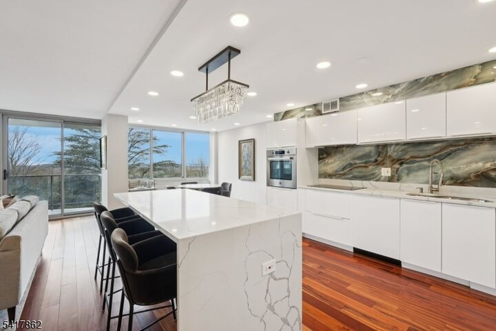 Property Photo:  1 Claridge Dr 104  NJ 07044 