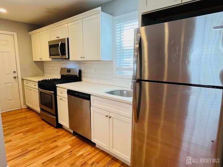 Property Photo:  36 Maple Avenue 1  NJ 08837 
