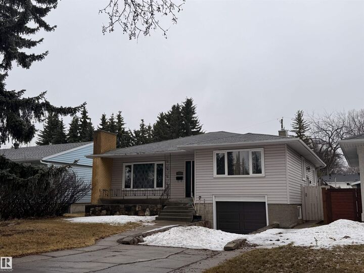 Property Photo:  7921 97 Avenue NW  AB T6C 2B6 