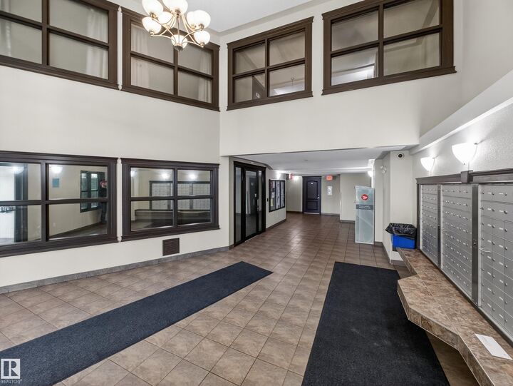 Property Photo: 9363 Simpson Drive NW 1111 AB T6R 0N2