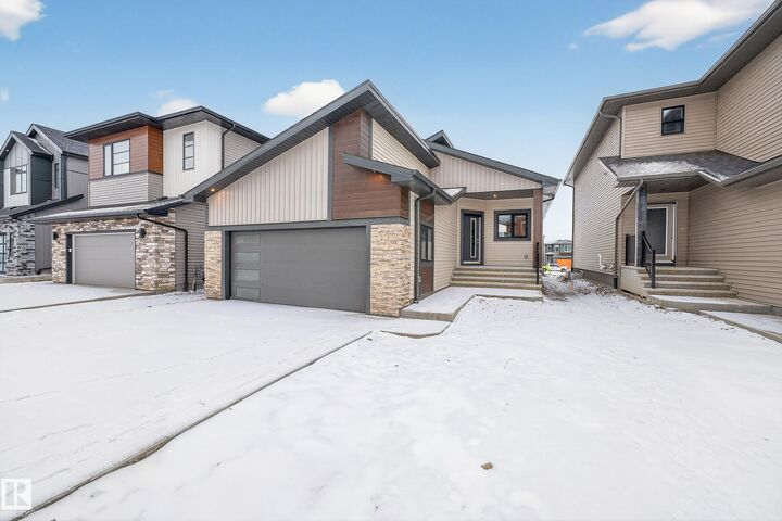 Property Photo: 7093 Kiviaq Crescent SW AB T6W 5N7