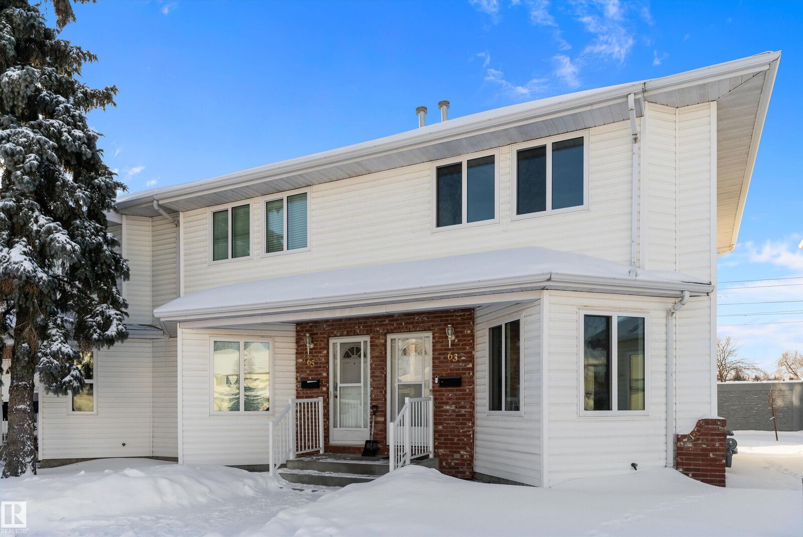 Property Photo: 1033 Youville Drive NW 63 AB T6L 6V9