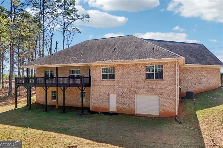 Property Photo:  7055 Bannister Road  GA 30028 